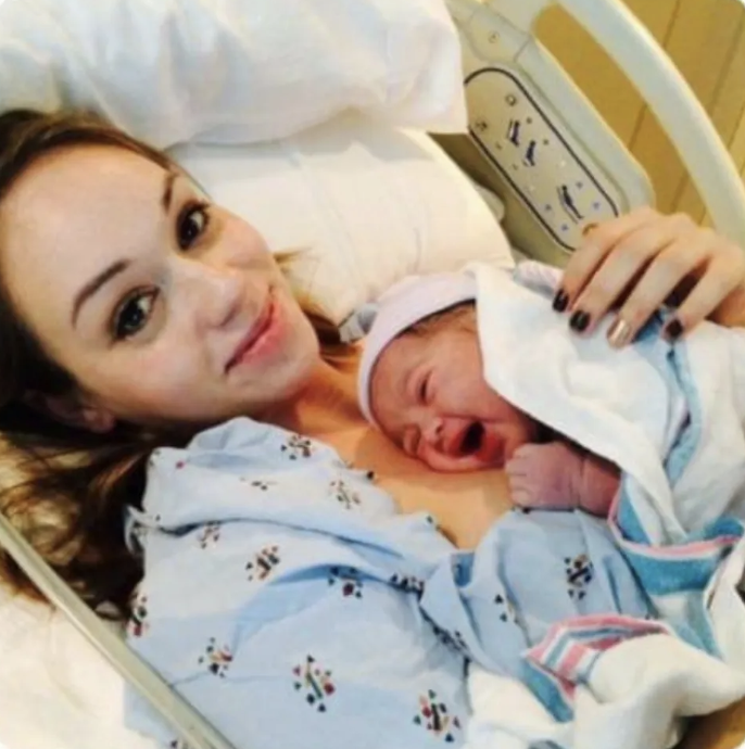 Jessica Kent with her newborn daughter on June 12, 2012. Because of a lack of structural support in Arizona, she was forced to enter her child into the foster care system.